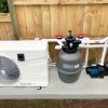 Swimming pool heater and filtration unit
