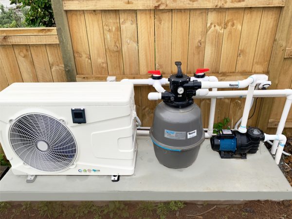 Swimming pool heater and filtration unit