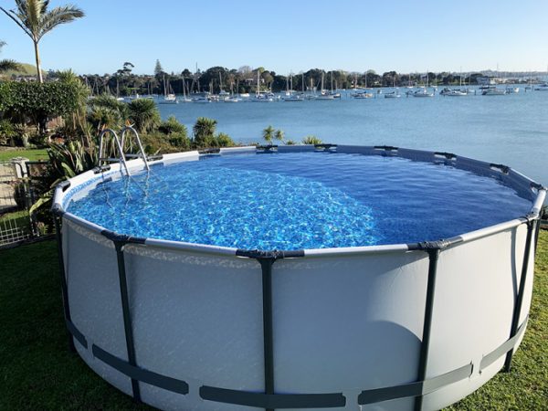 Round Bestway above-ground pool with ocean view in Auckland