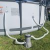 Filter pump and hoses connected to Bestway above-ground pool
