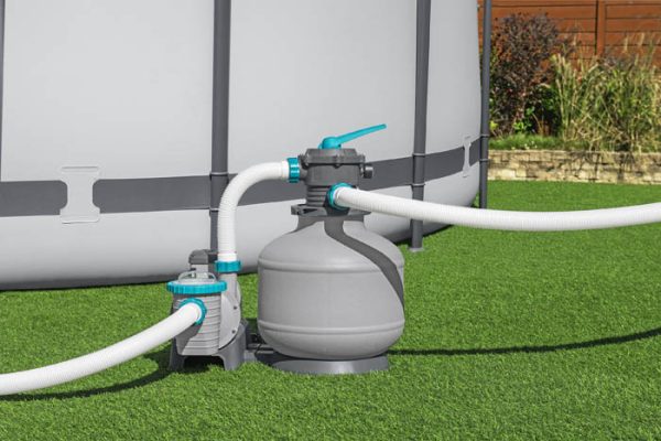 Bestway 2200 Gph sand filter pump connected to above-ground pool