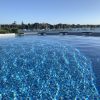 Clear water in Bestway above-ground pool with marina view