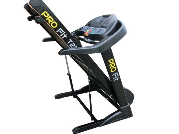 Folding treadmill in upright position for compact storage